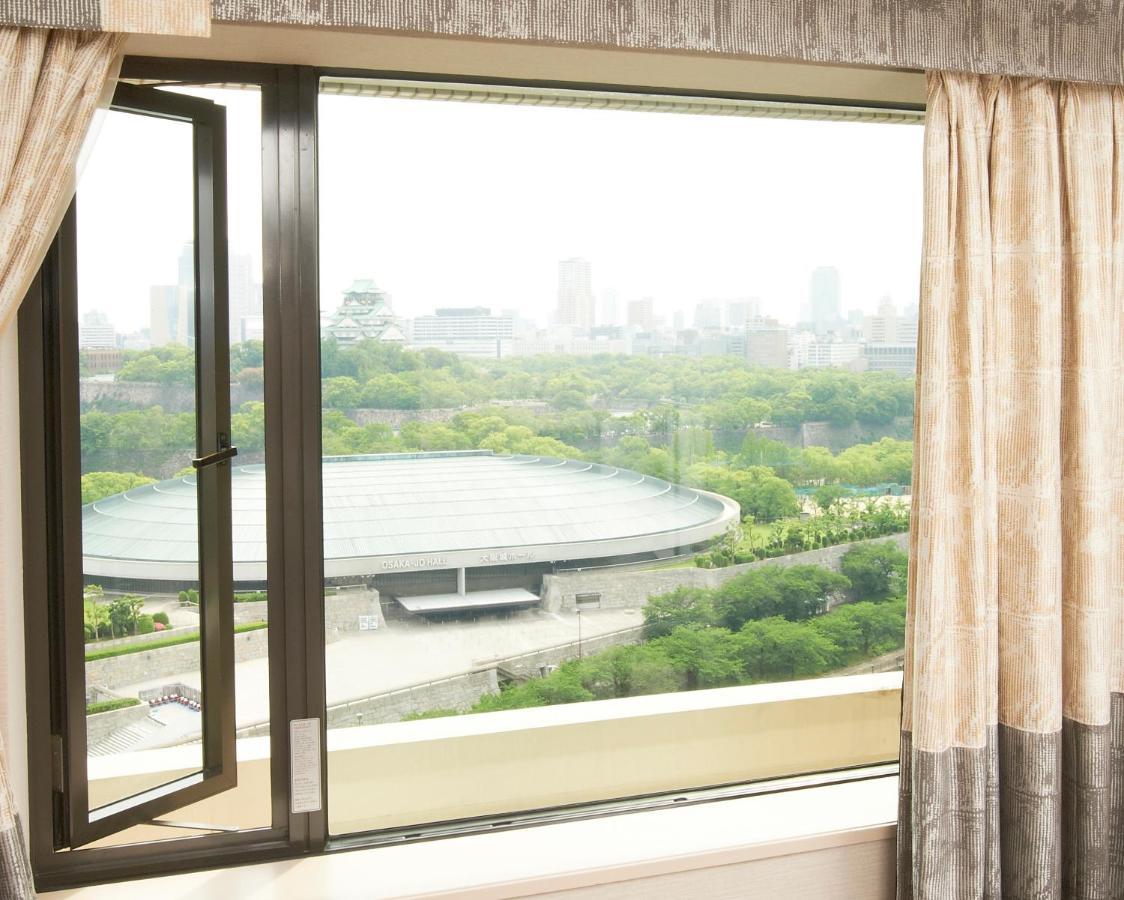 โรงแรมนิว โอตานิ โอซาก้า ภายนอก รูปภาพ View of the National Olympic Sports Centre from the hotel