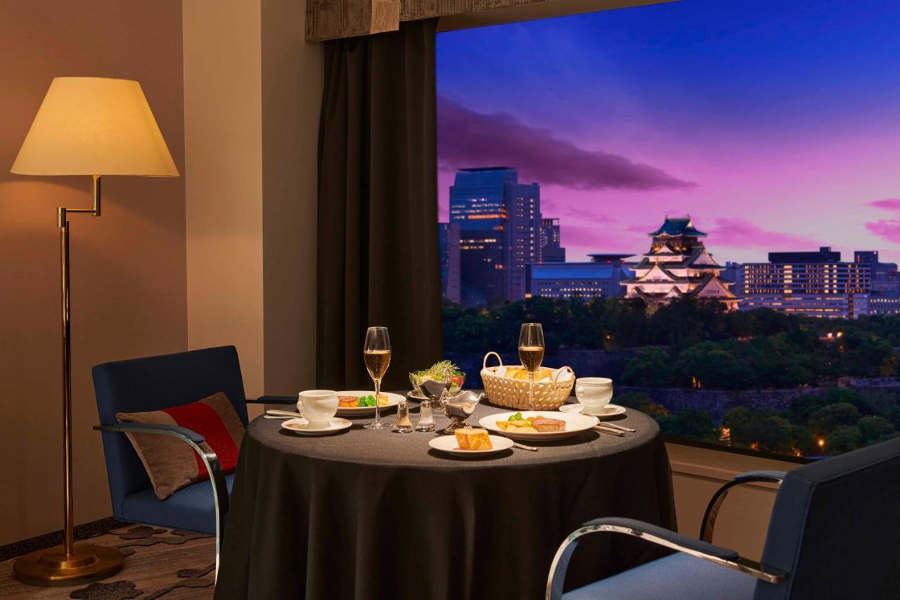 โรงแรมนิว โอตานิ โอซาก้า ภายนอก รูปภาพ A view of the Osaka Castle from a suite at the hotel